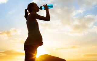 Pregnant Women Drinking Water